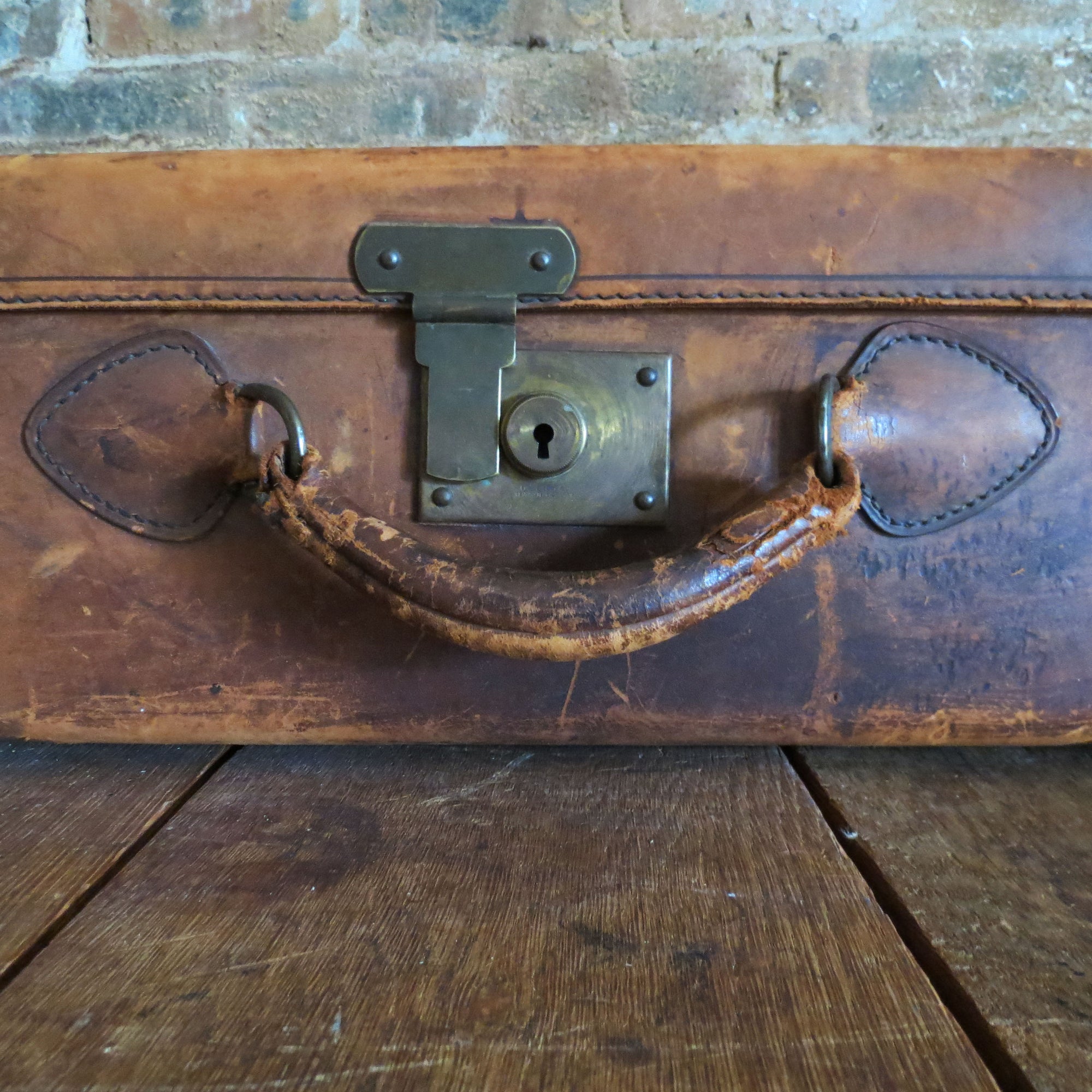 Premium Photo  Vintage wood colored brown suitcase on wooden table