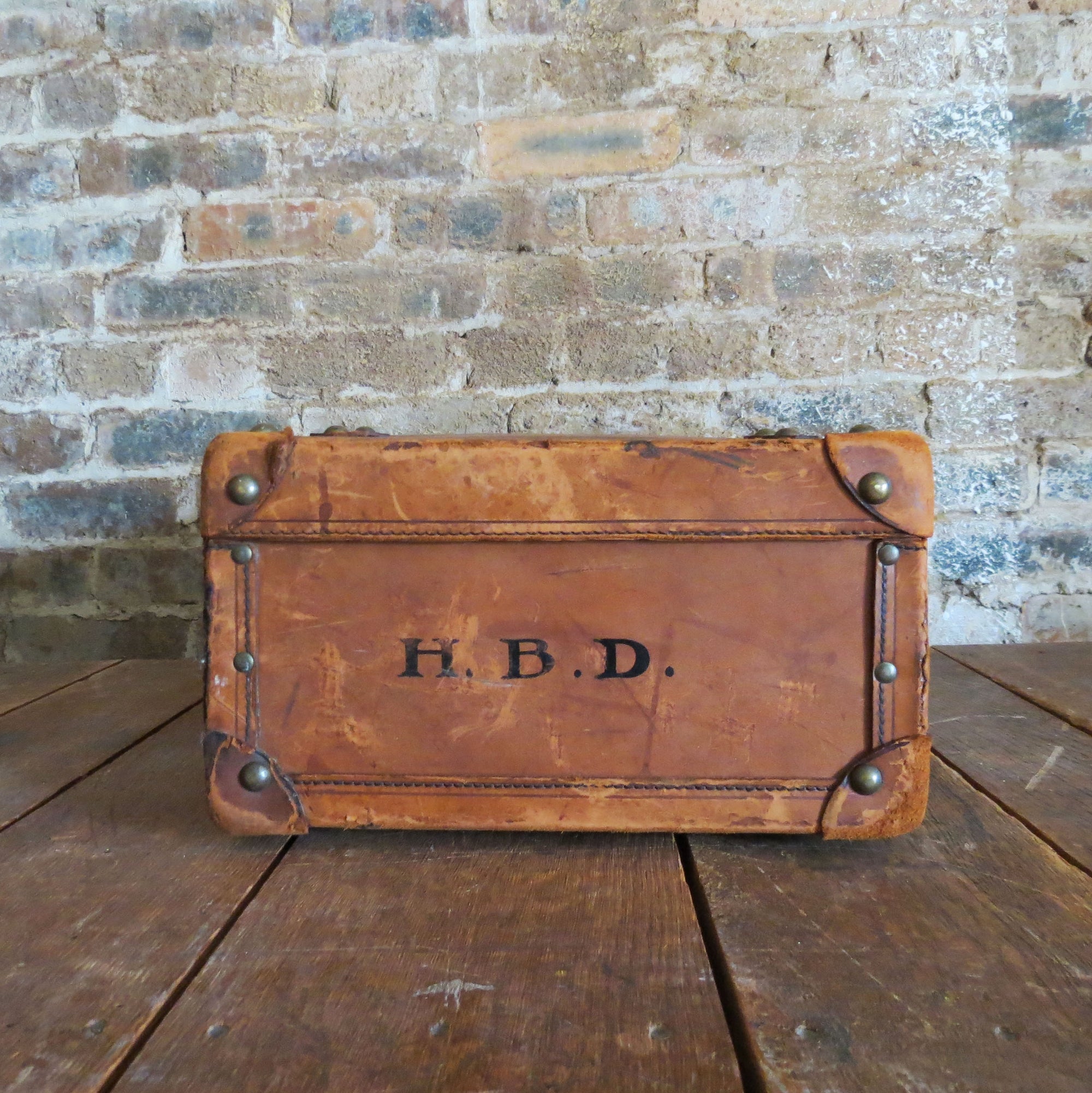 Premium Photo  Vintage wood colored brown suitcase on wooden table